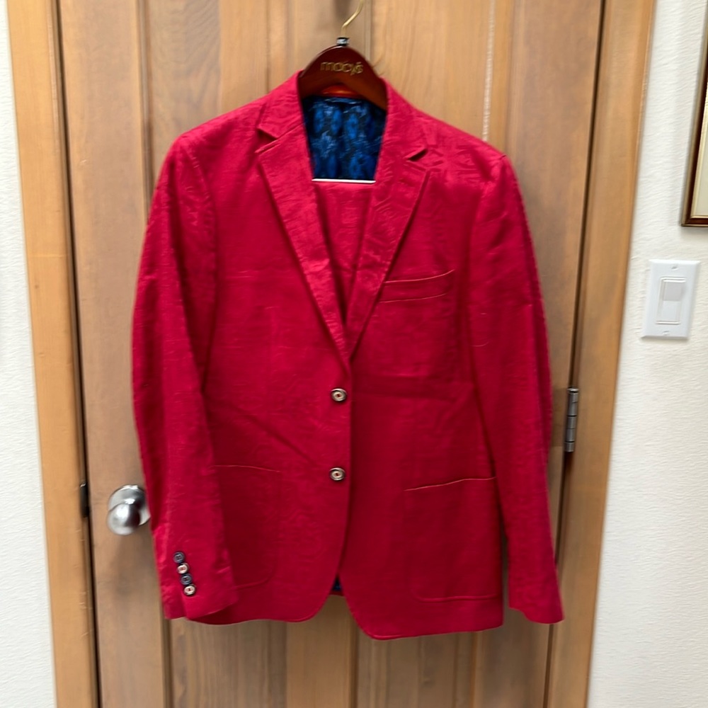 Red suit perfect for a fun wedding